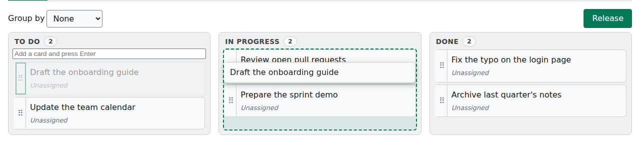 A card of the Team Kanban board is picked up with the keyboard and held over the In Progress column, which is outlined with a dashed line.