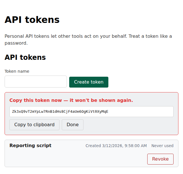 The API tokens page right after creating the token Reporting script: the one-time notice, the token value with the Copy to clipboard and Done buttons, and the token in the list