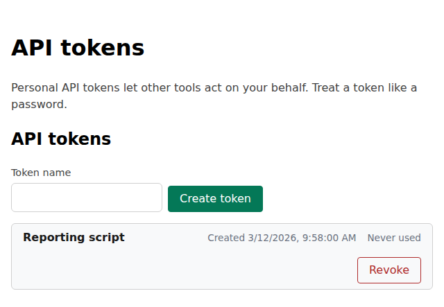 The API tokens page after leaving it and coming back: the token Reporting script is listed with its creation time and Never used, with a Revoke button, and the token value is gone for good